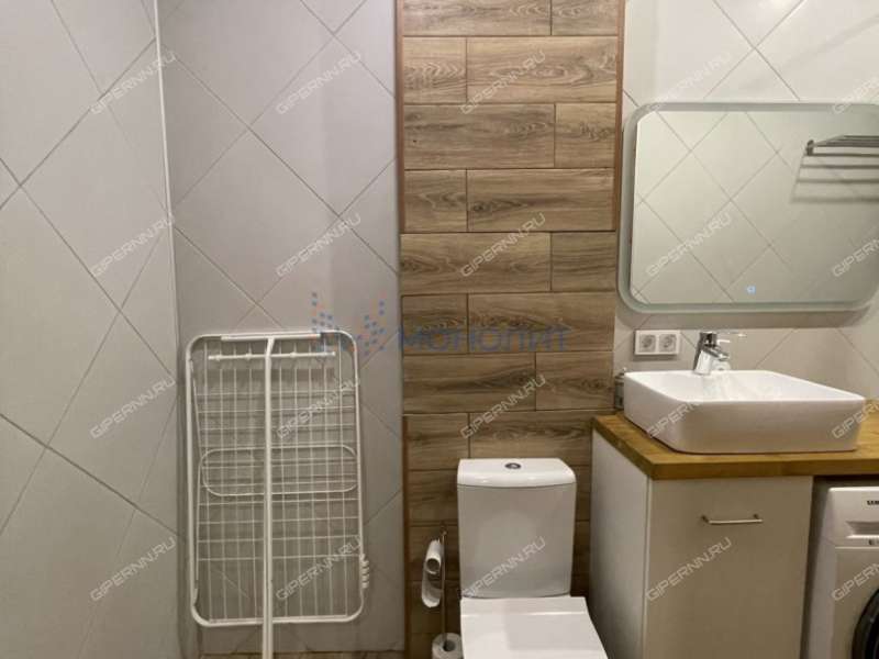 трёхкомнатная квартира на Комсомольской улице дом 3